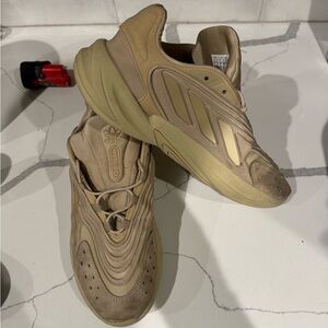 Adidas Ozelia originals size 13 Gold
